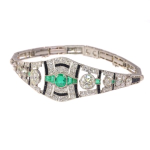 Sophisticated Art Deco Platinum Bracelet: Diamonds, Emeralds, and Onyx
