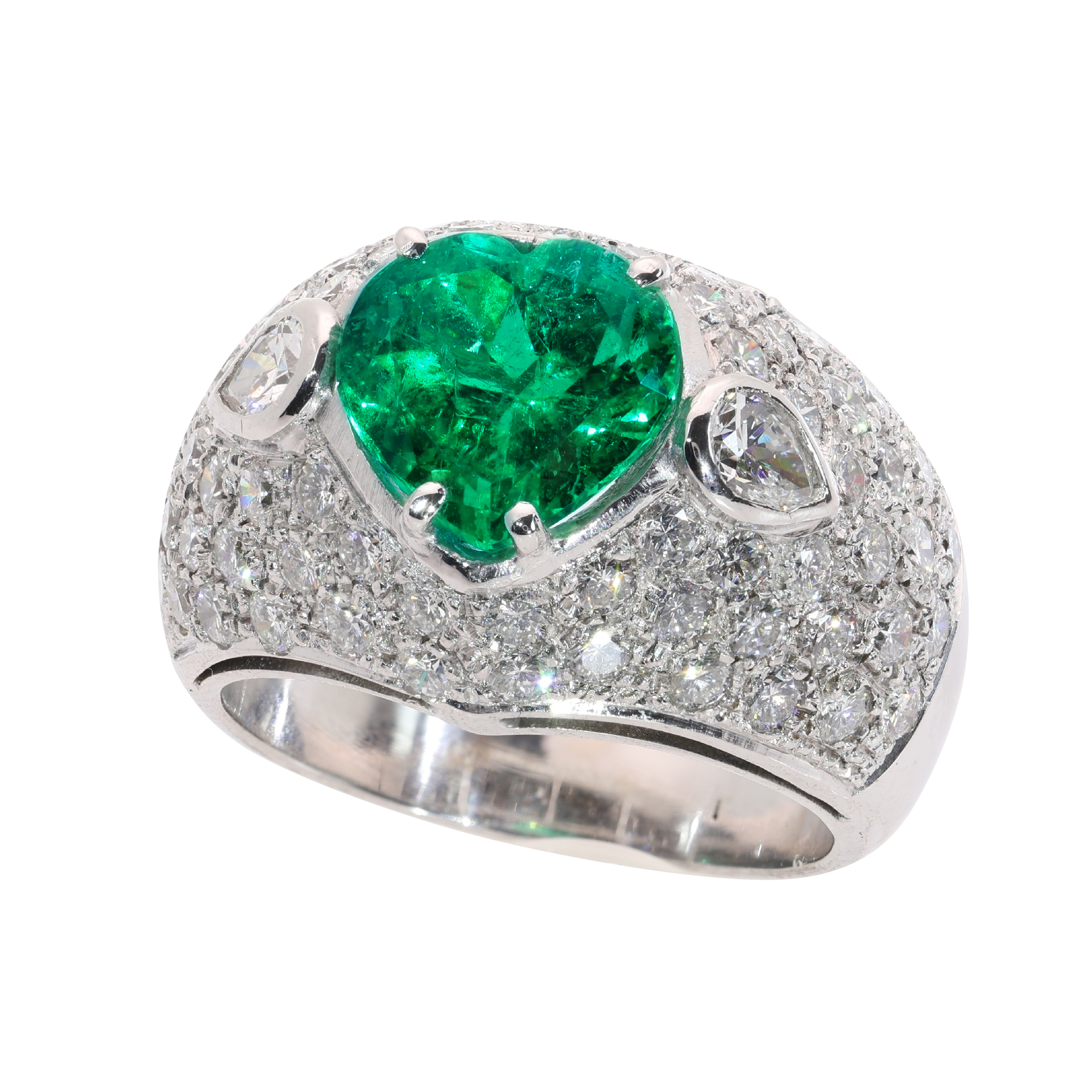 A Bold Vintage Ring with a Colombian Emerald Heart and Diamonds, circa 1990